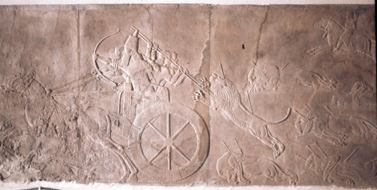 This royal lion hunt relief from Nineveh (in modern-day Iraq) shows beardless courtiers in a royal chariot.