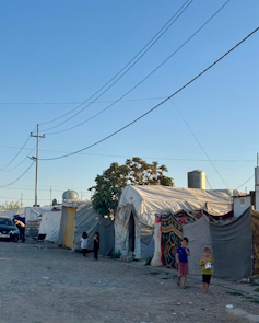 Image of a refugee camp with children
