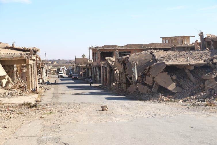 A devastated and ruined city block.