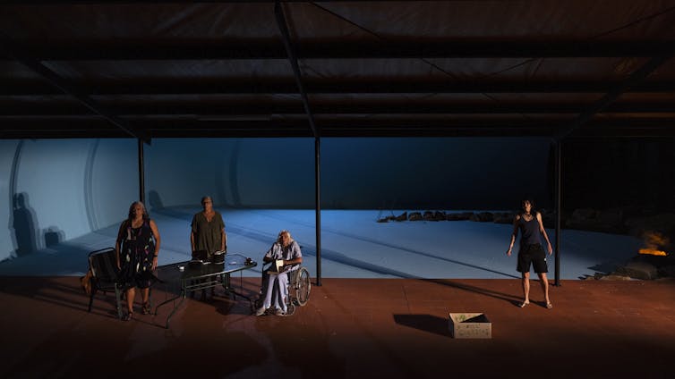 Production image: the four women on stage.
