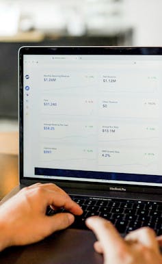 A customer analytics program running on a laptop