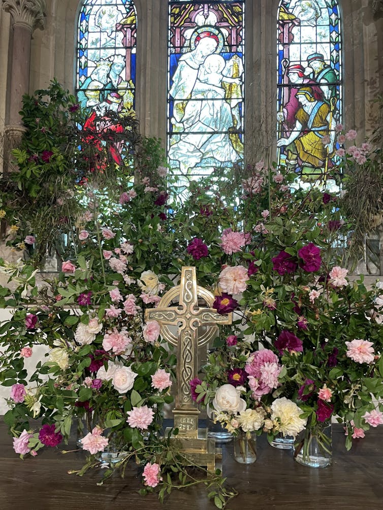 Flowers displayed in a church.