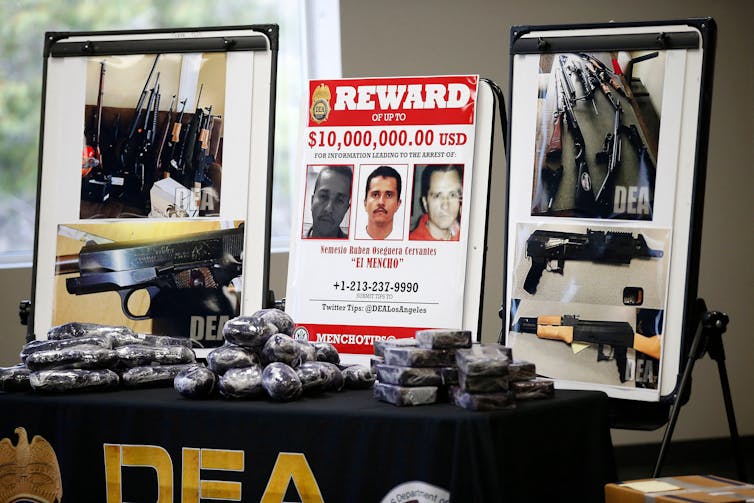 Wanted posters, confiscated drugs and other evidence against Mexican drug kingpin Nemesio 