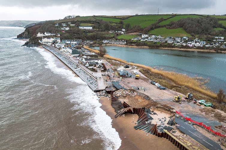 aerial shot of slapton ley and coastal damage with huge break in road structure