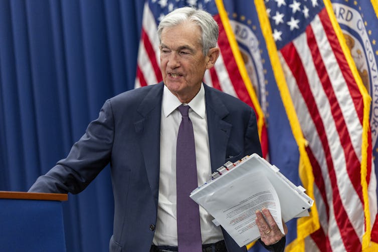 Federal Reserve Board Chairman Jerome Powell departs following a press conference