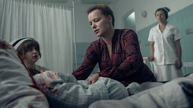 A still from the Netflix series, Lead Children. Jolanta Wadowska-Król attends to a child suffering from lead poisoning who has been hospitalised.