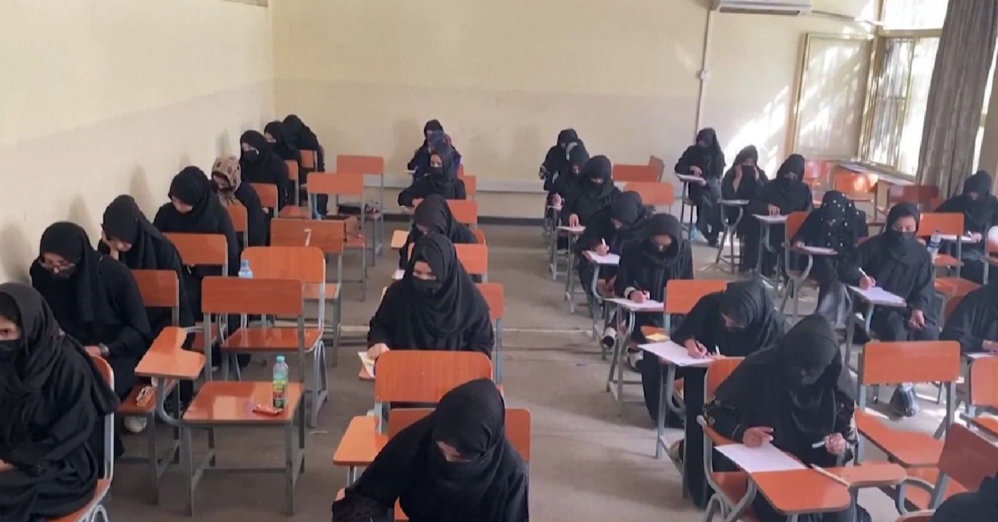 Afghan girls taking a university exam.