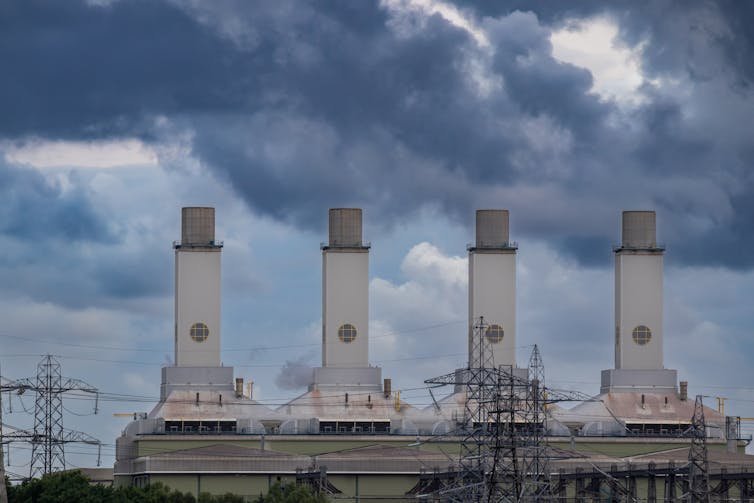 industrial chimneys, moody sky