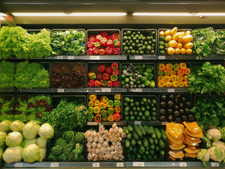 Fresh fruits and vegetables in the produce section of a grocery store