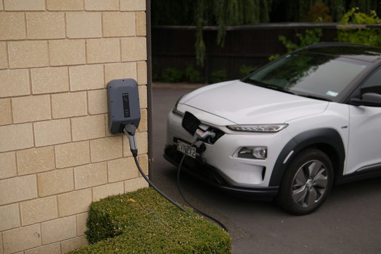 EV charging in a driveway