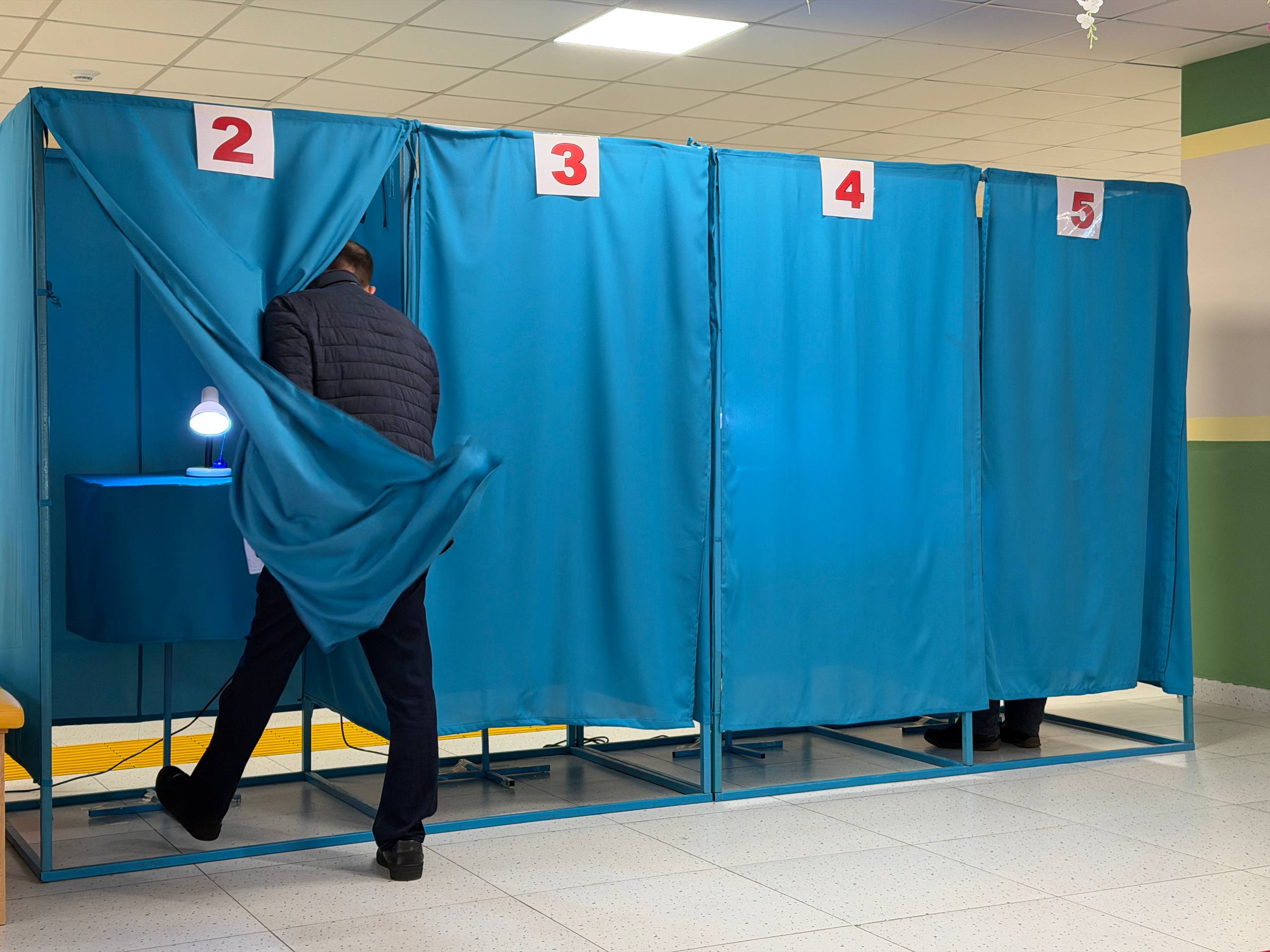 A voter casting a ballot.