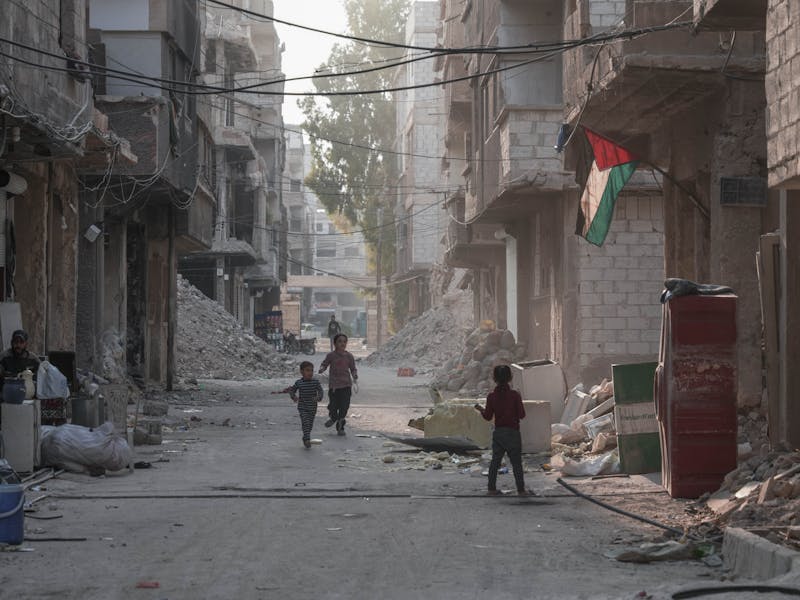 Children playing in a street in war-torn Damascus, Syria. Undated photo by Baraa Obied on Pexels.