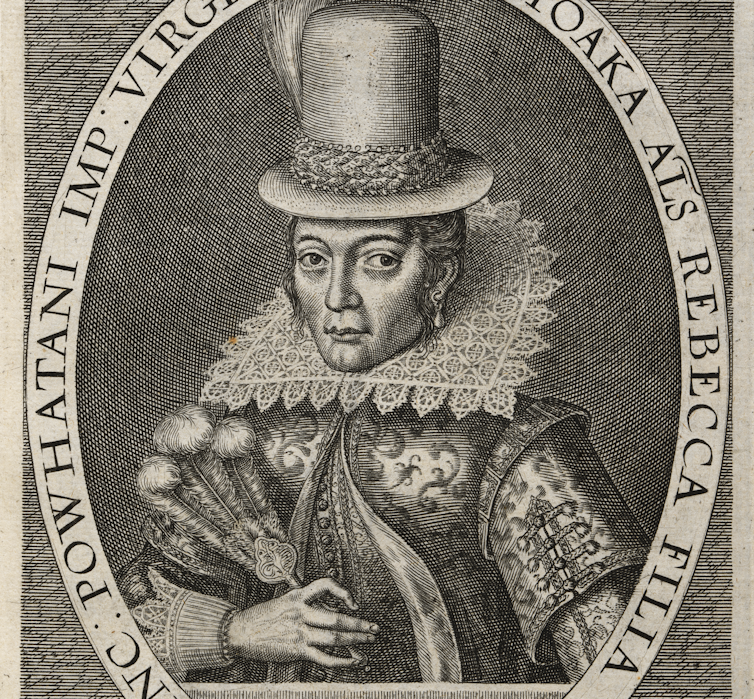 A black and white engraving of a woman with a serious expression, wearing an ornately embroidered gown.