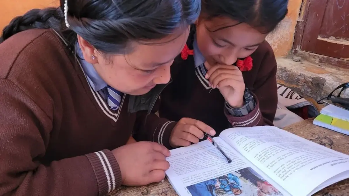 Photo: Provided by Anil Adhikari, Students of grade 6 at Janabahal Secondary School is reading renowned wildlife biologist Dr. George Schaller’s story. 