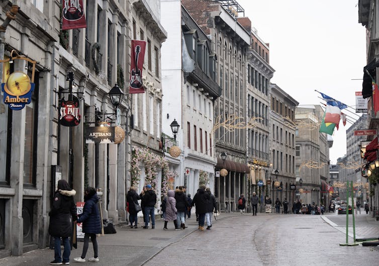 Passers-by walking through streets