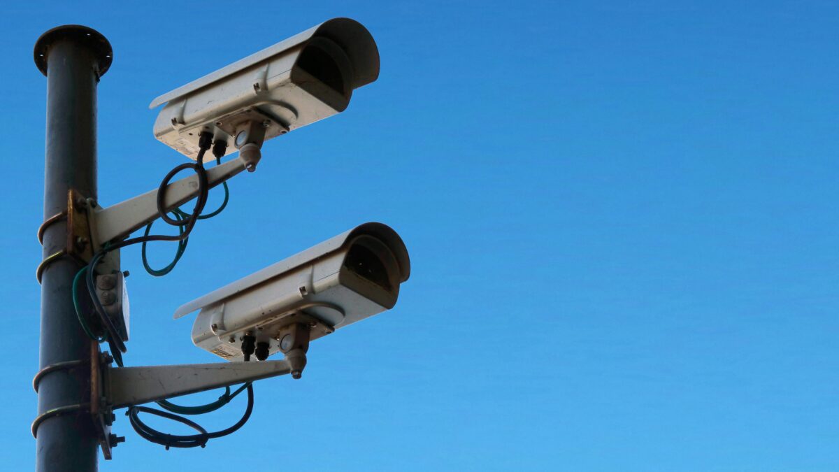 Two security cameras mounted on a pole. Representative image by user Atypeek Dgn via Pexel. Used under a Pexels License.