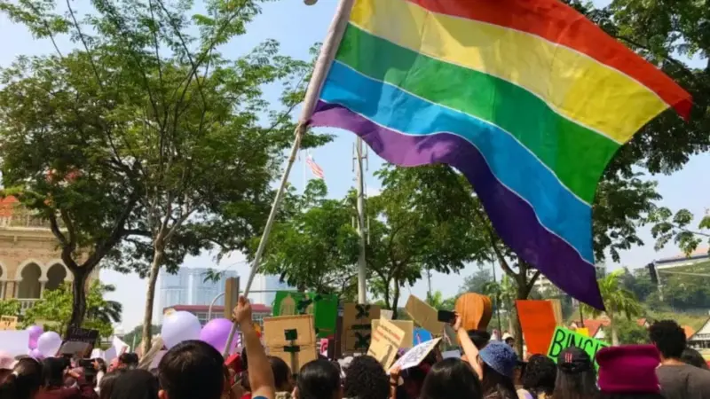 Malaysia march with Pride flag