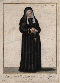An illustration of a nun holding rosary beads.
