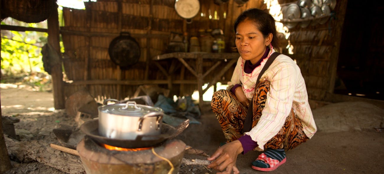Woman cooking in Cambodia