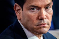 A dark-haired man.