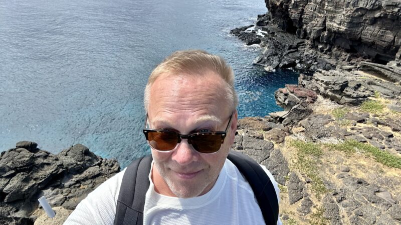 Image of the author, Siimo Kaasik, standing by the sea