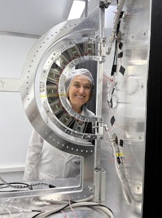 Daniela Bortoletto with a pixel ring for the inner tracker.