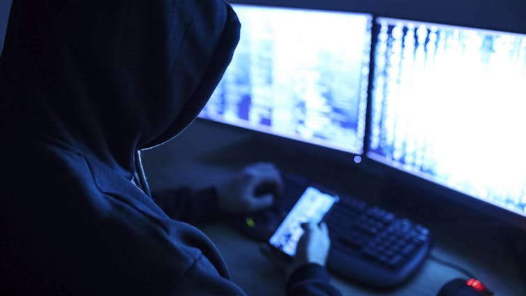 stock image of hacker attacking the internet