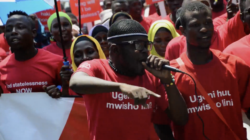 Makonde protestors in Nairobi hold a protest calling on the state to offer Makonde people Kenyan citizenship. Screenshot from YouTube documentary “The Journey of the Makonde to Citizenship.”&nbsp;