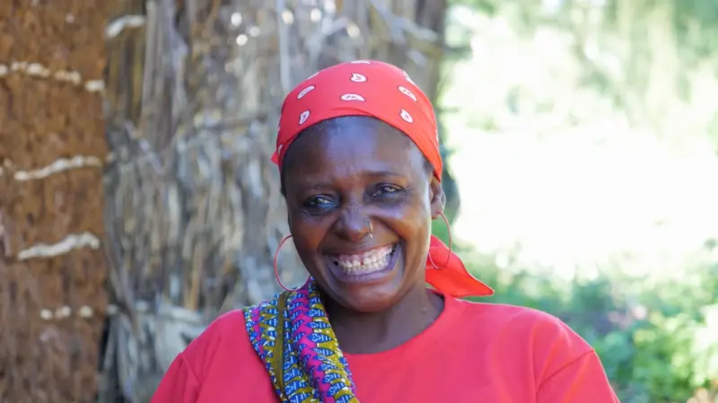 A Mokonde woman expresses her joy at finally obtaining Kenyan citizenship.