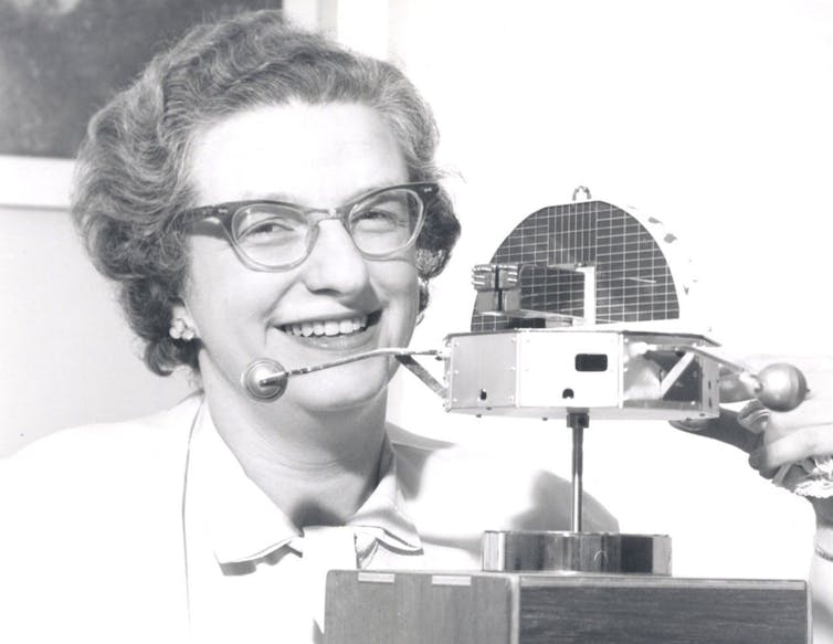 Nancy Roman with a model of the Orbiting Solar Observatory (OSO) astronomy satellite in 1962.