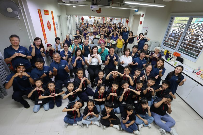 SP volunteers with Hany Soh, Adviser to Marsiling-Yew Tee GRC GROs (Woodgrove), seniors, and children at the launch of Care Corner’s Frailty Management Programme.