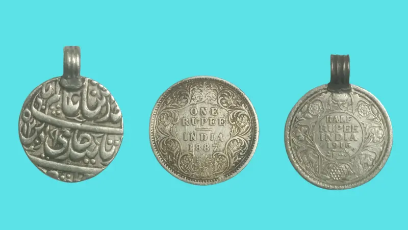 Rana Tharu women traditional attire coins. The coins are from from British India Time and Muslim regime time.