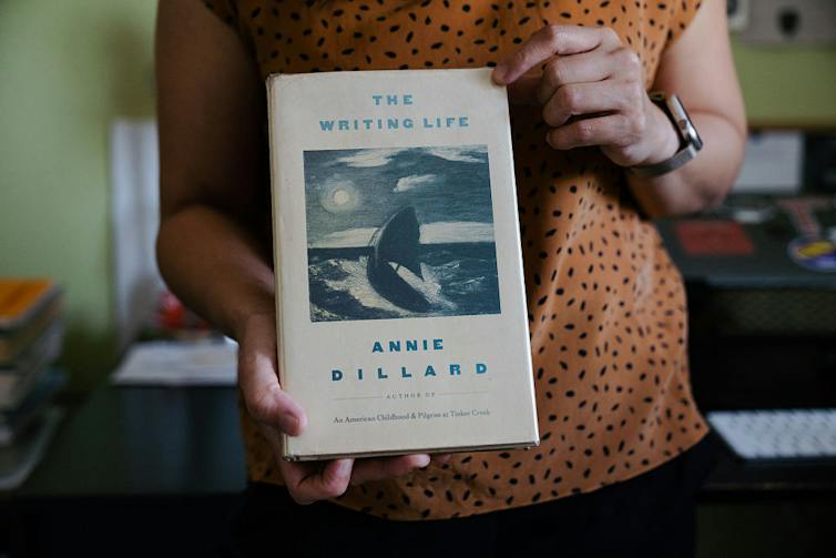 Close-up of Annie Dillard's 'The Writing Life,' held by Celeste Ng