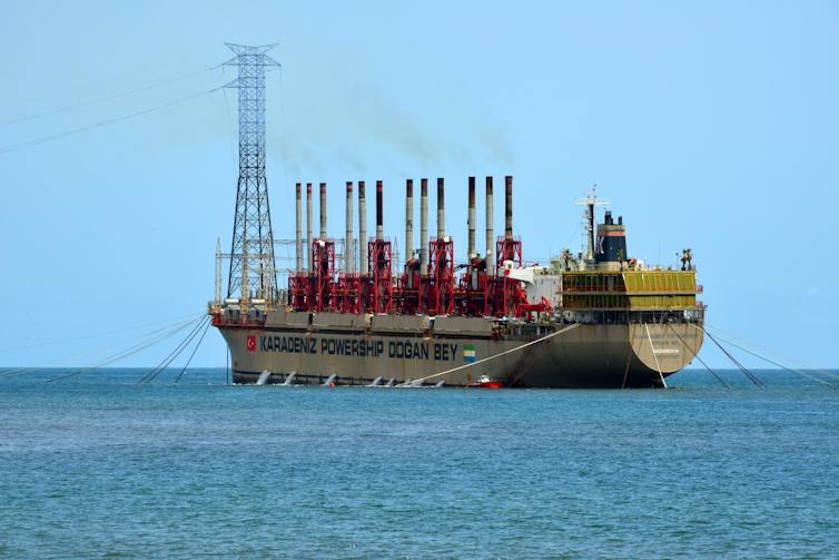A large ship surrounded by ocean.