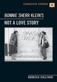 Book jacket showing two women in front of a spraypainted wall that says smash sexism.