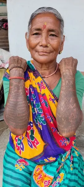 A woman with tattoos on her lower arms
