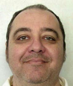 Mugshot of a white man.