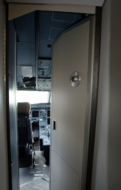 A large metal door is shown