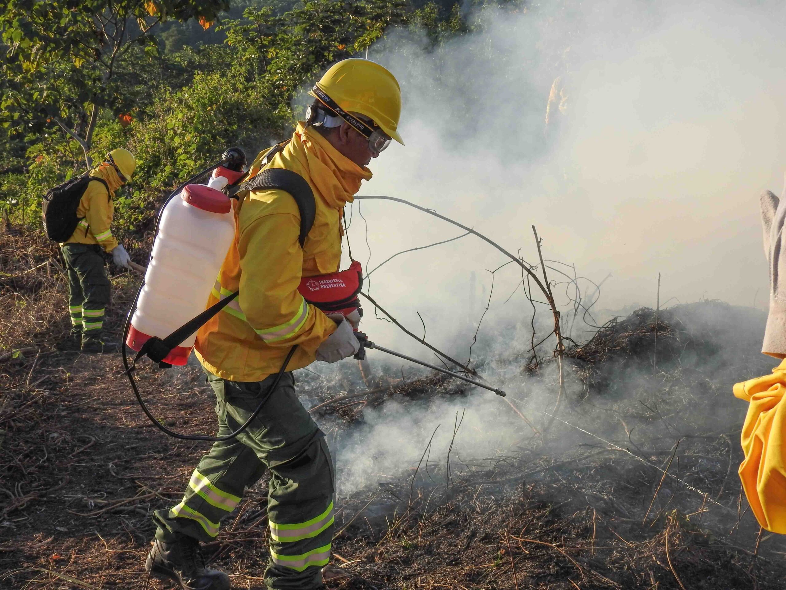 The Cool Earth initiative in Cutivireni and Oviri works around three key concepts: the monitoring of satellite fire weather alerts, the introduction of a flag-based system regarding safe times to conduct traditional fire practices, and practical training to contain small blazes and prevent them from causing devastation to the Indigenous people in the rainforest. Photo by Cool Earth, 2026; used with permission.