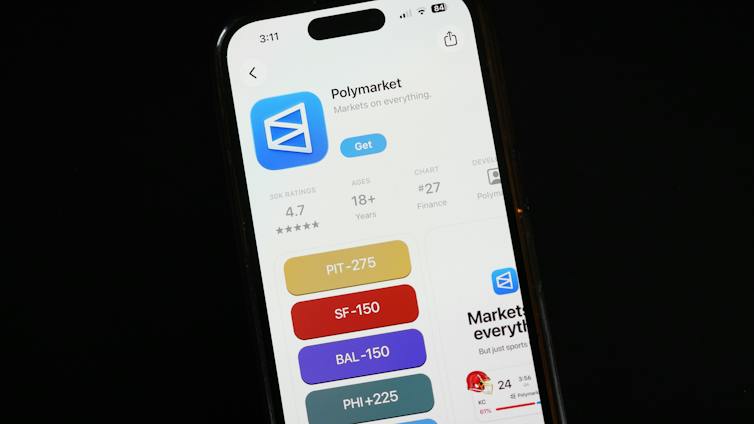 The prediction market app Polymarket is displayed on a mobile phone